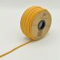 Preview: Kordel rund 6 mm in Ocker, aufgerollt neben weiteren Farben der Reihe